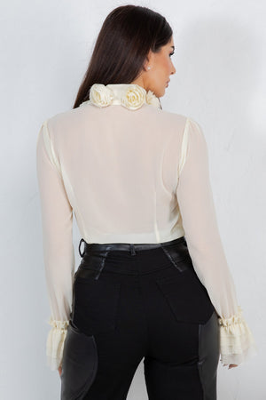Lyana ed flower trim long sleeve blouse