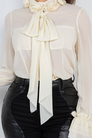 Lyana ed flower trim long sleeve blouse