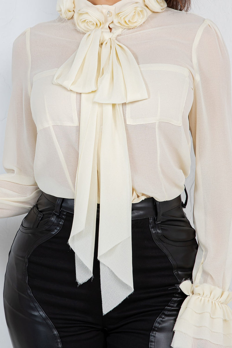 Lyana ed flower trim long sleeve blouse