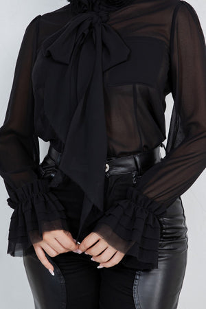 Lyana ed flower trim long sleeve blouse