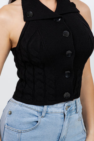 Lotas a knit top featuring large tone-on-tone buttons and textured side details. designed with a versatile neckline